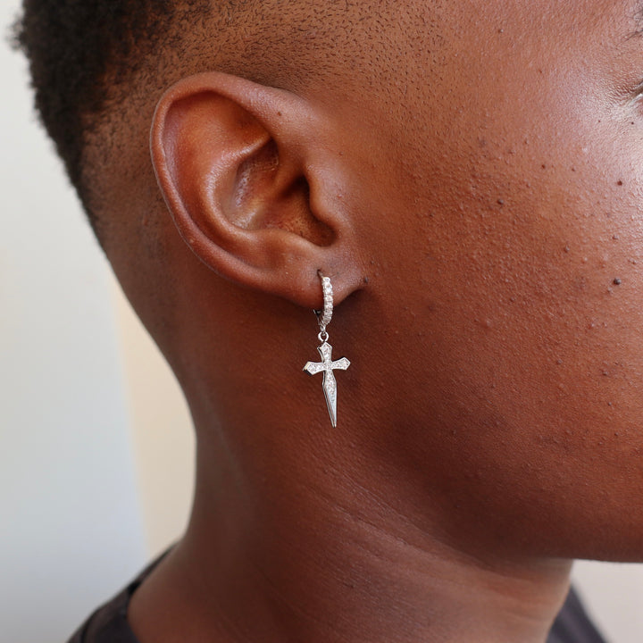 Model Wears The Hoop Cross Earrings - White Gold