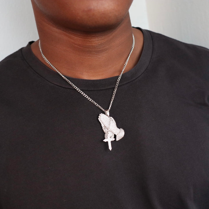 Model Wears The Iced Praying Hands Pendant - White Gold