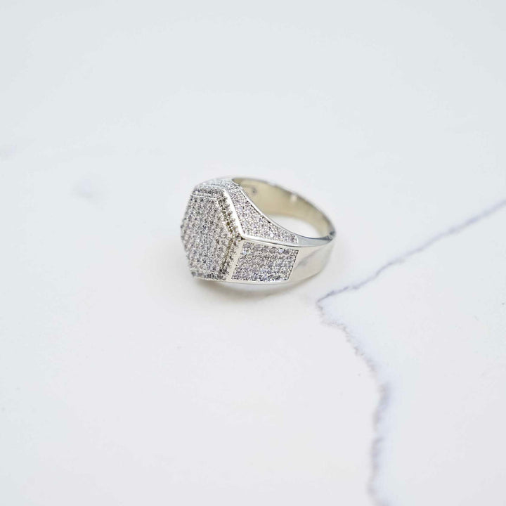 The Boss Ring - White Gold on White Marble