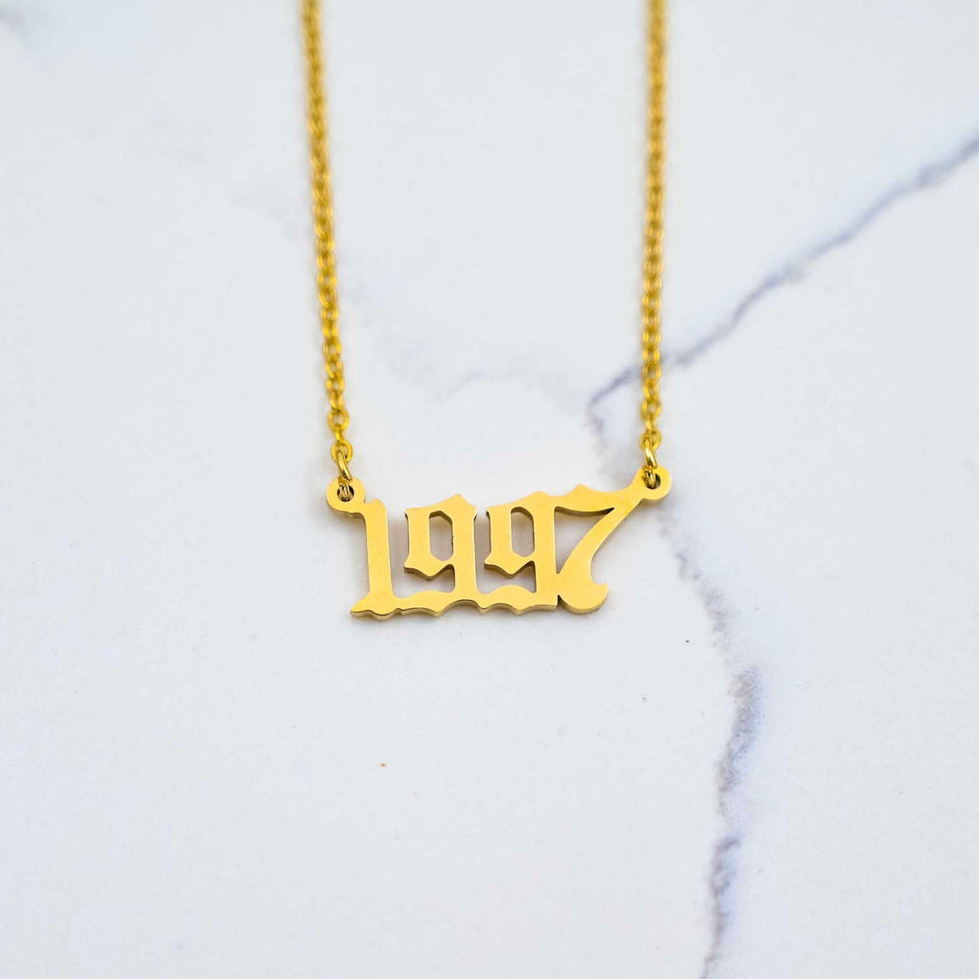 1997 Nameplate Necklace - Gold on White Marble