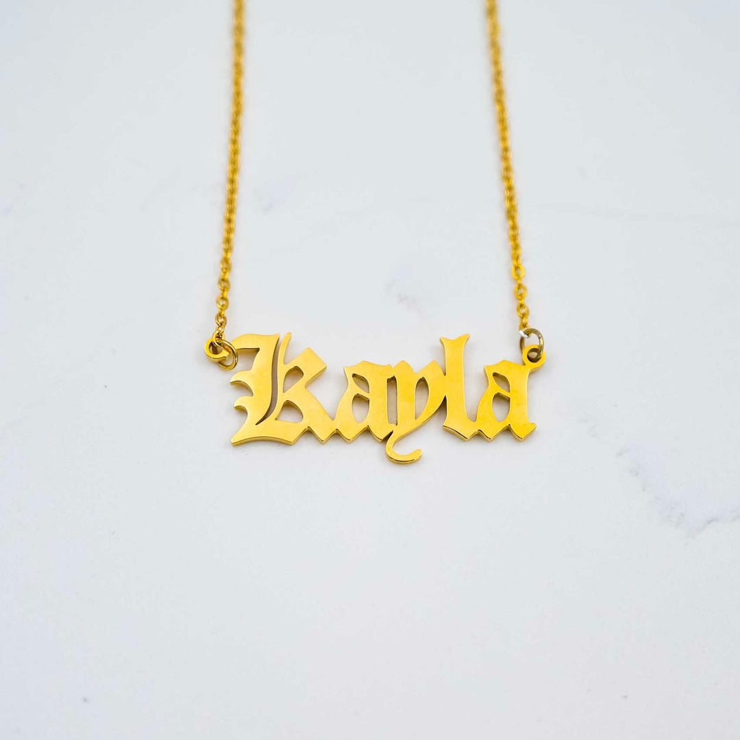 Women's Custom Nameplate Necklace - Gold on White Marble